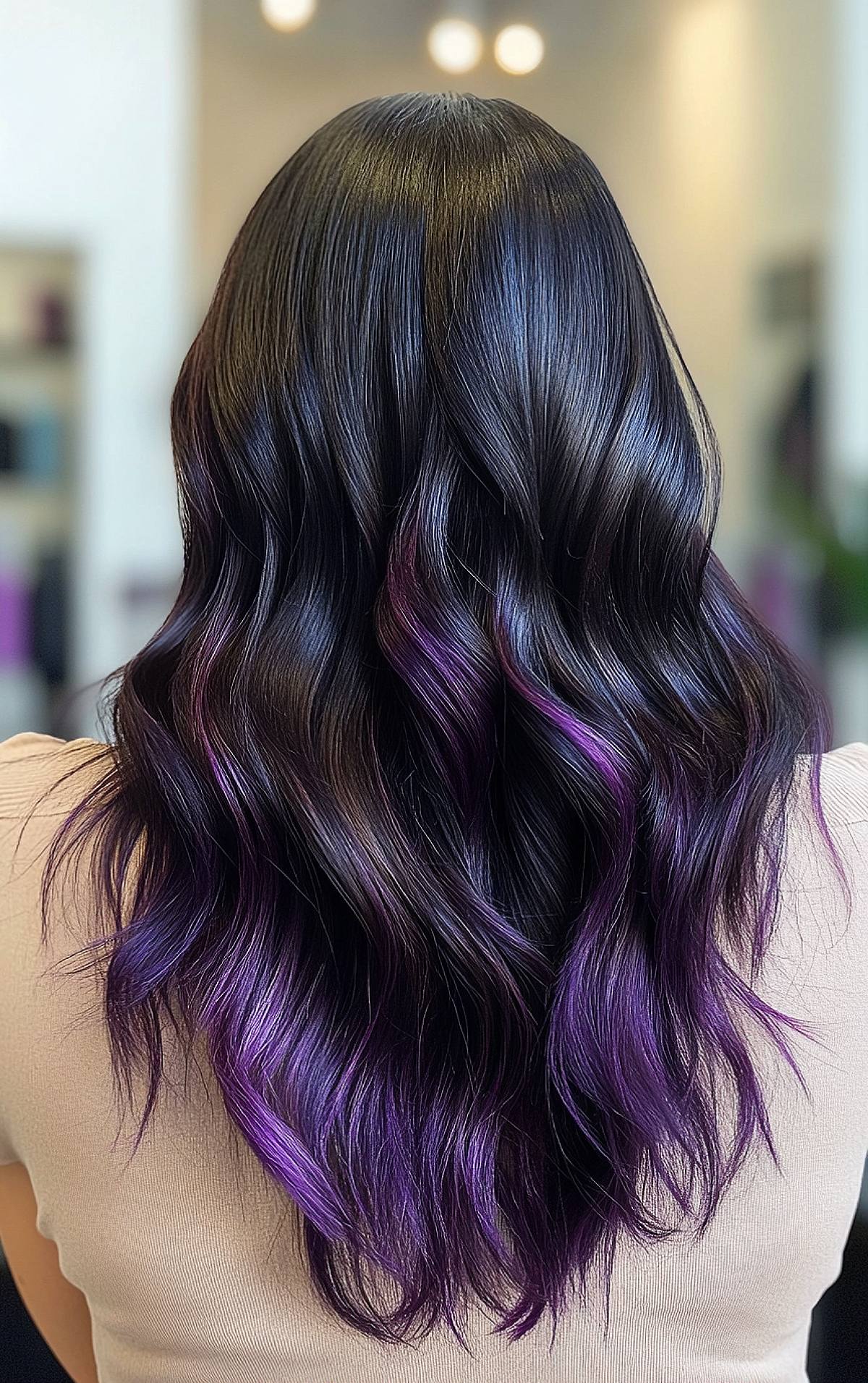 Black to purple ombre hairstyle with soft waves for medium to thick hair