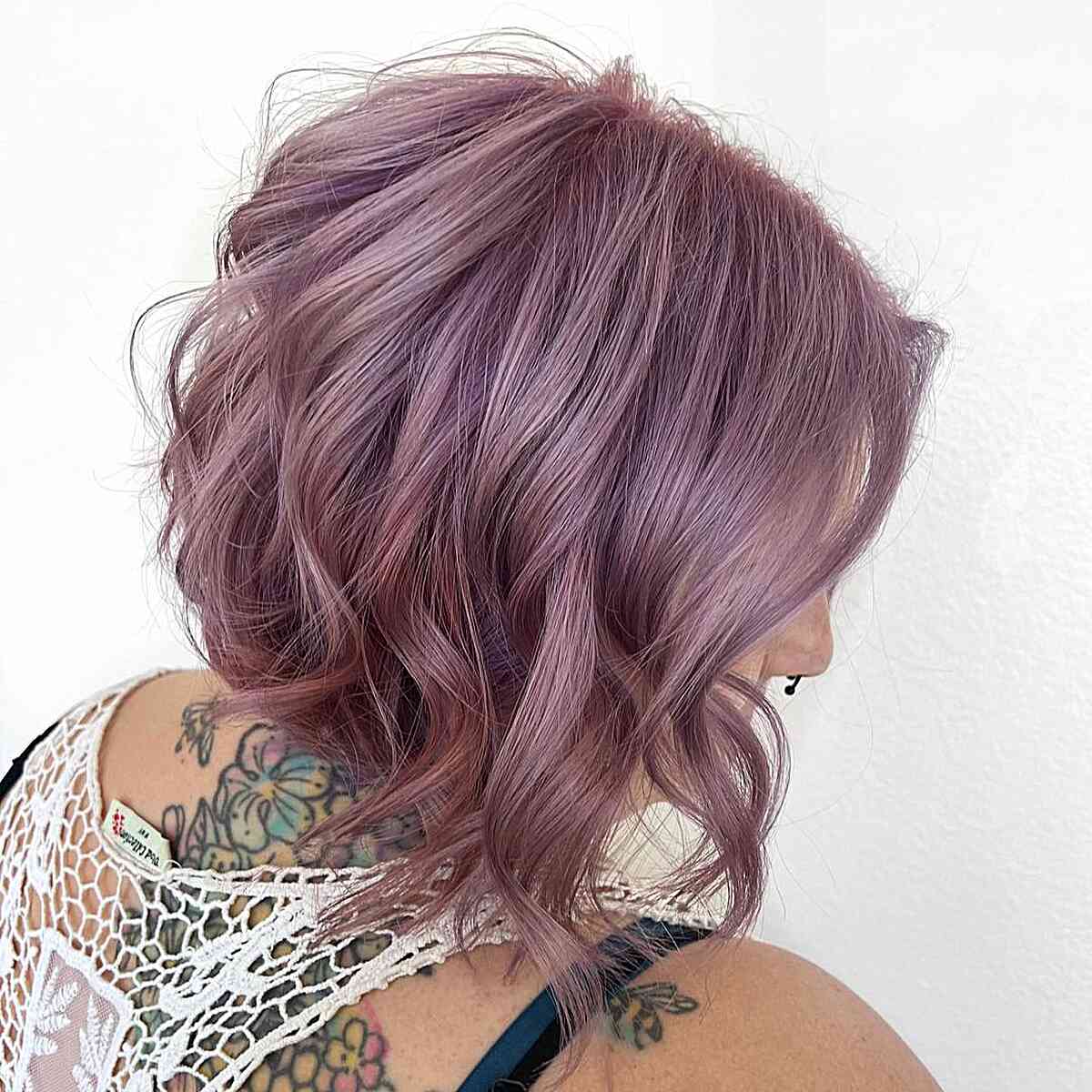 Purple hairstyle with pink highlights