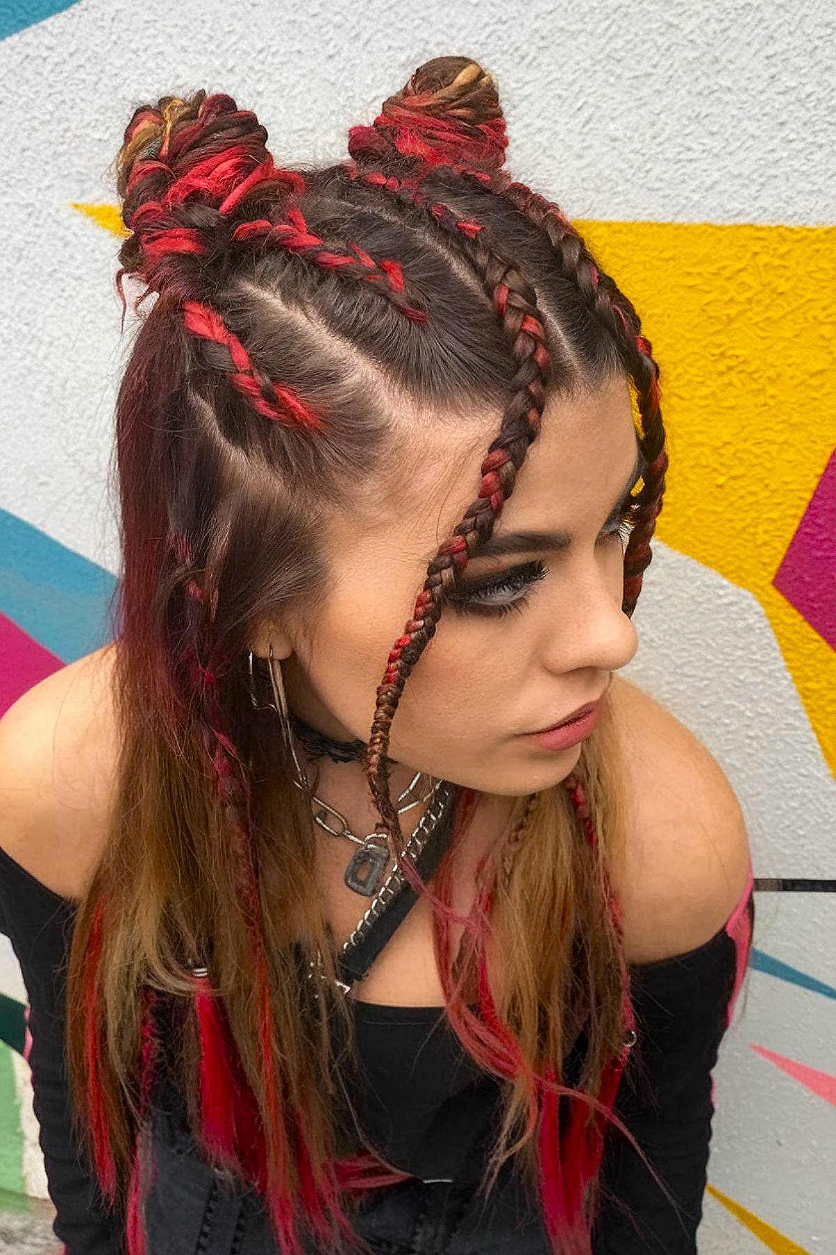 Red and brown braided space buns for a rave hairstyle