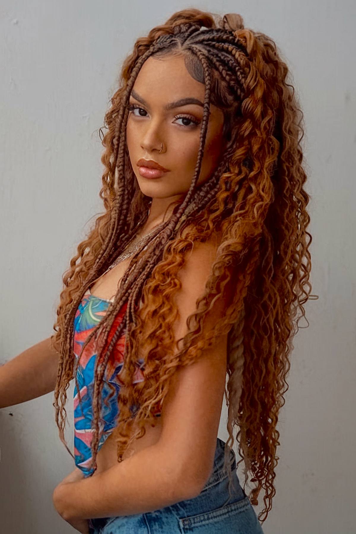 Coppery curly hair with braids for rave hairstyles