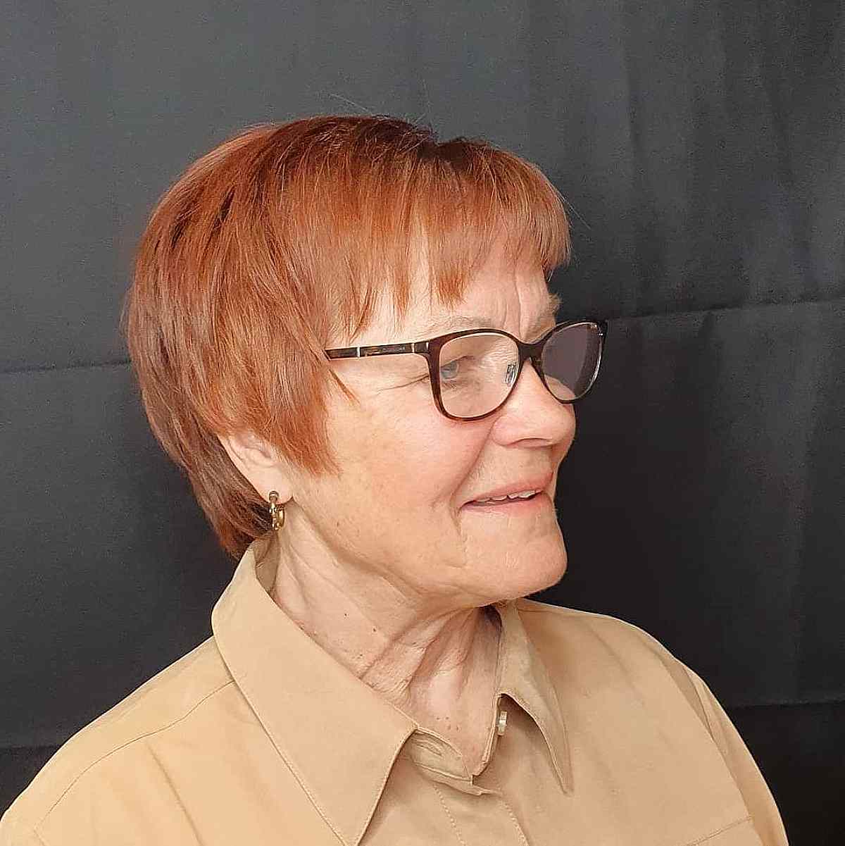 Short Razor Cut Pixie with Micro Bangs and Layers for Older Women