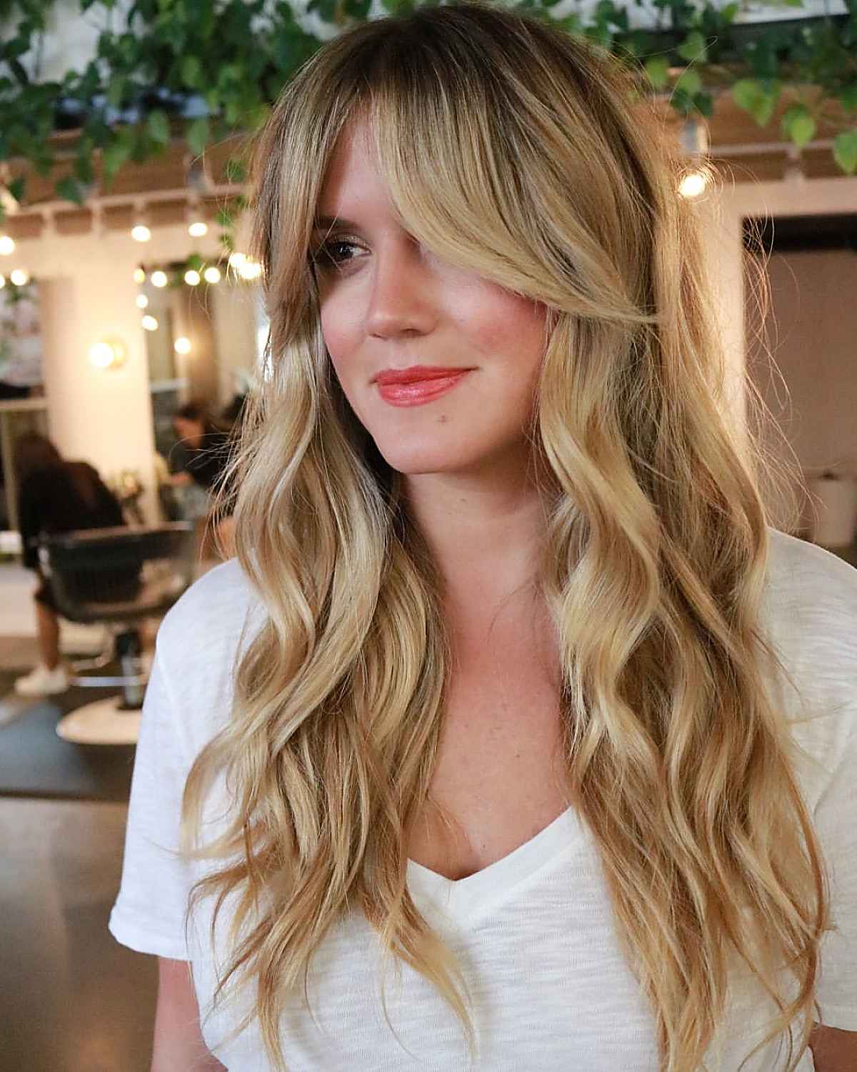 Razored Layers with Long Middle-Parted Bangs