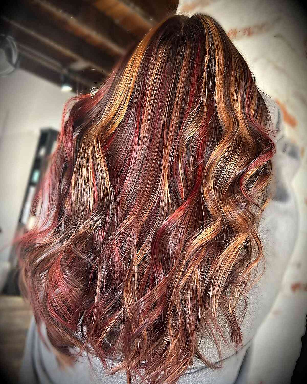 Red and Blonde Highlighted Accents on Long Brown Hair