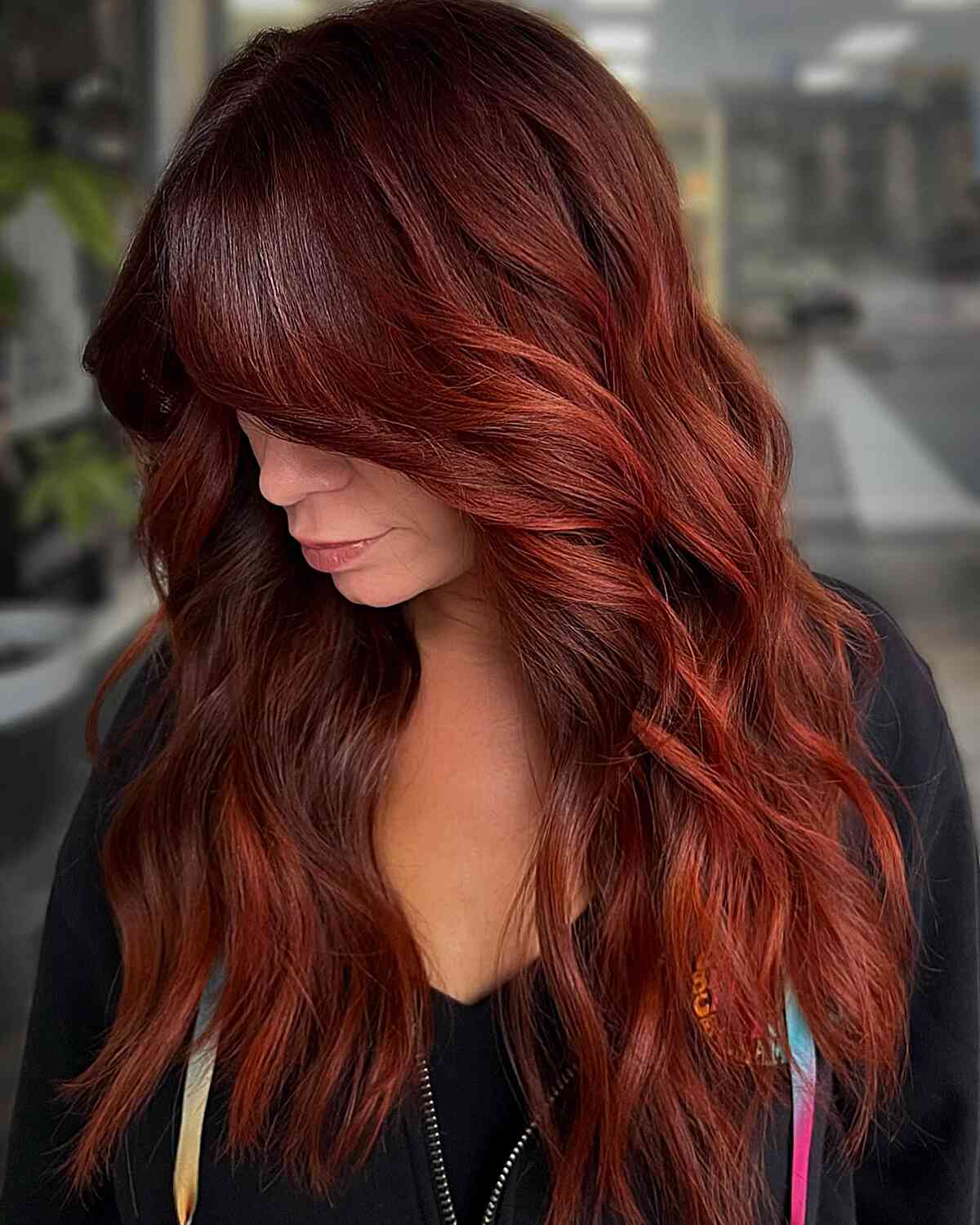 Red and Copper Balayage for women with long wavy hair