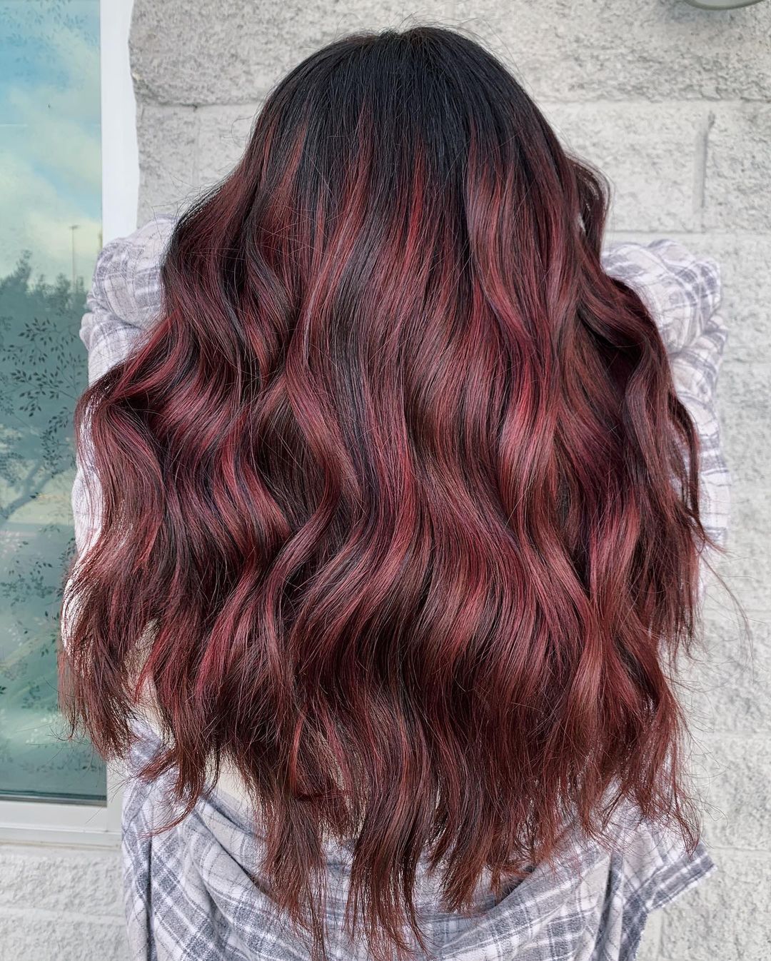 Stunning red highlights on dark brown hair