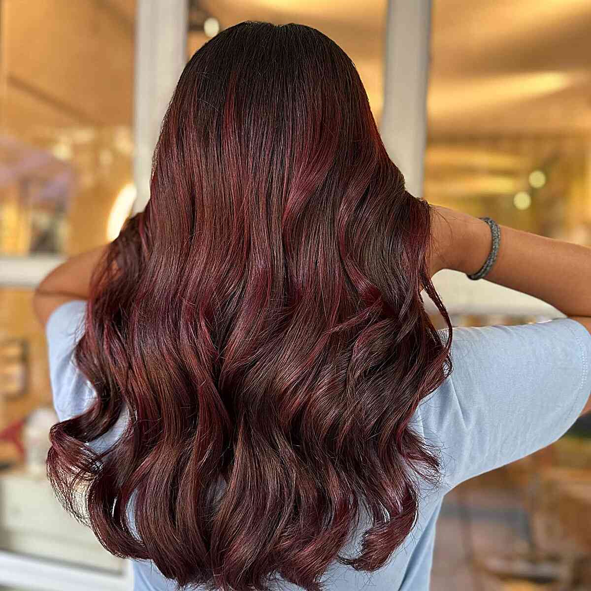 Long-Length Wavy Red Sangria Balayage Highlights on Brown Hair