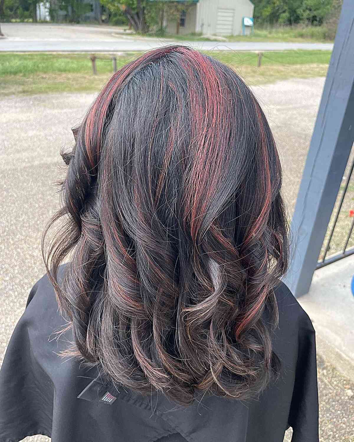 Red Thin Highlights and Loose Curls for Medium-Length Brown Hair