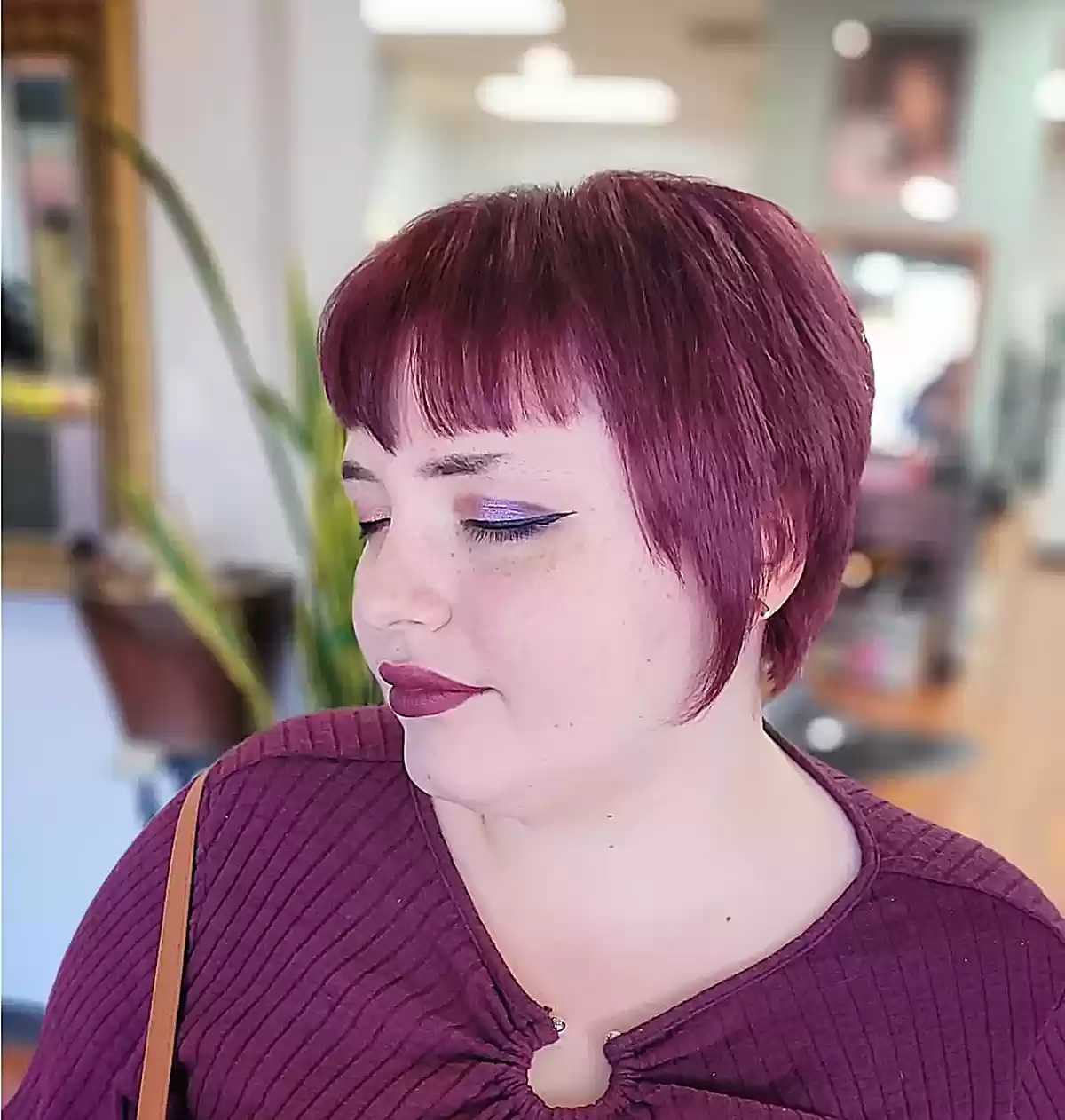 Red Velvet Burgundy Hue for Tapered Bob with Bangs on Ladies with Round Faces