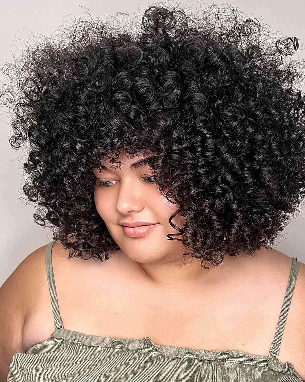 Rezo Cut Thick and Voluminous Curls for Fuller Faces