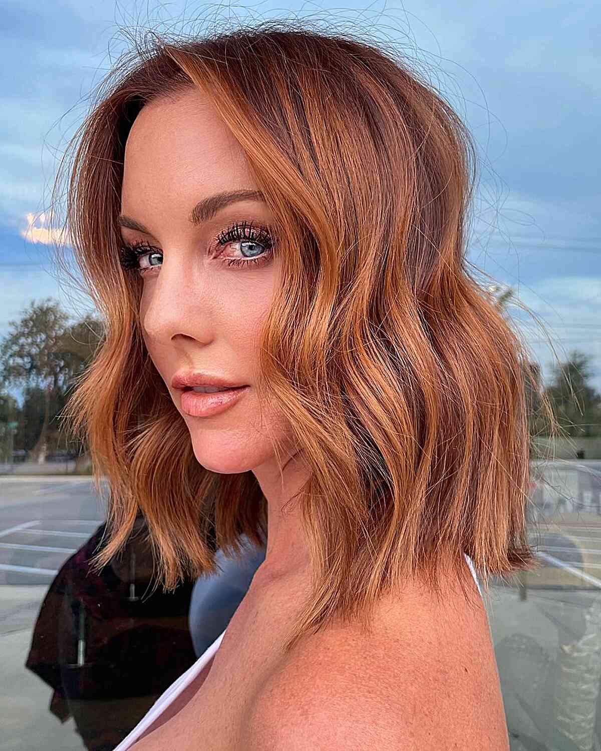 Rich Auburn Balayage Lob with Textured Ends