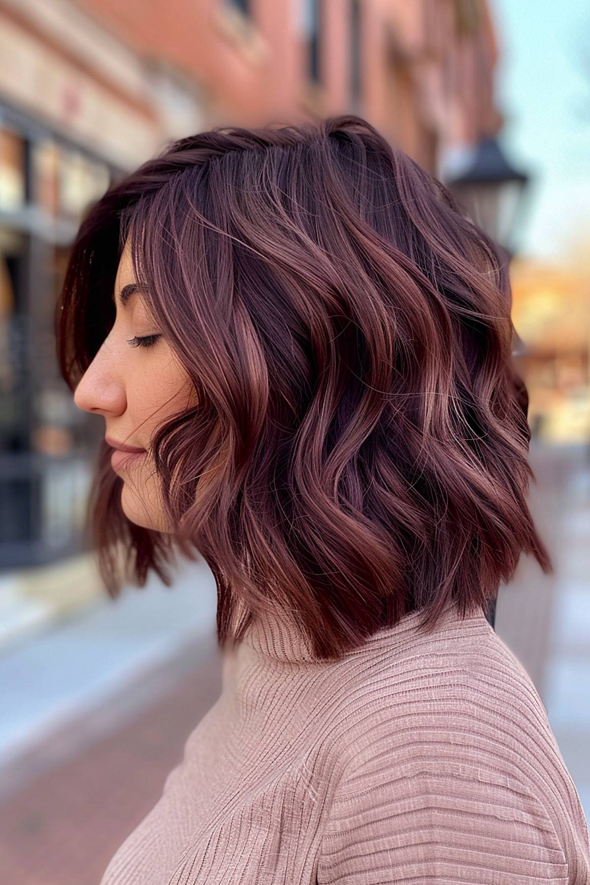 Rippleedge bob with rich plum tones and defined waves