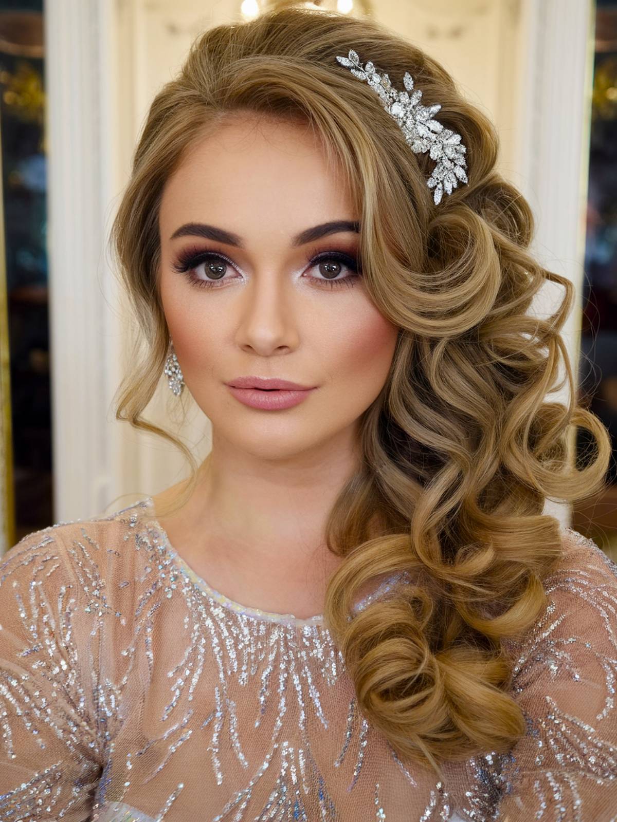 Romantic hairstyle for curly hair on bridesmaids