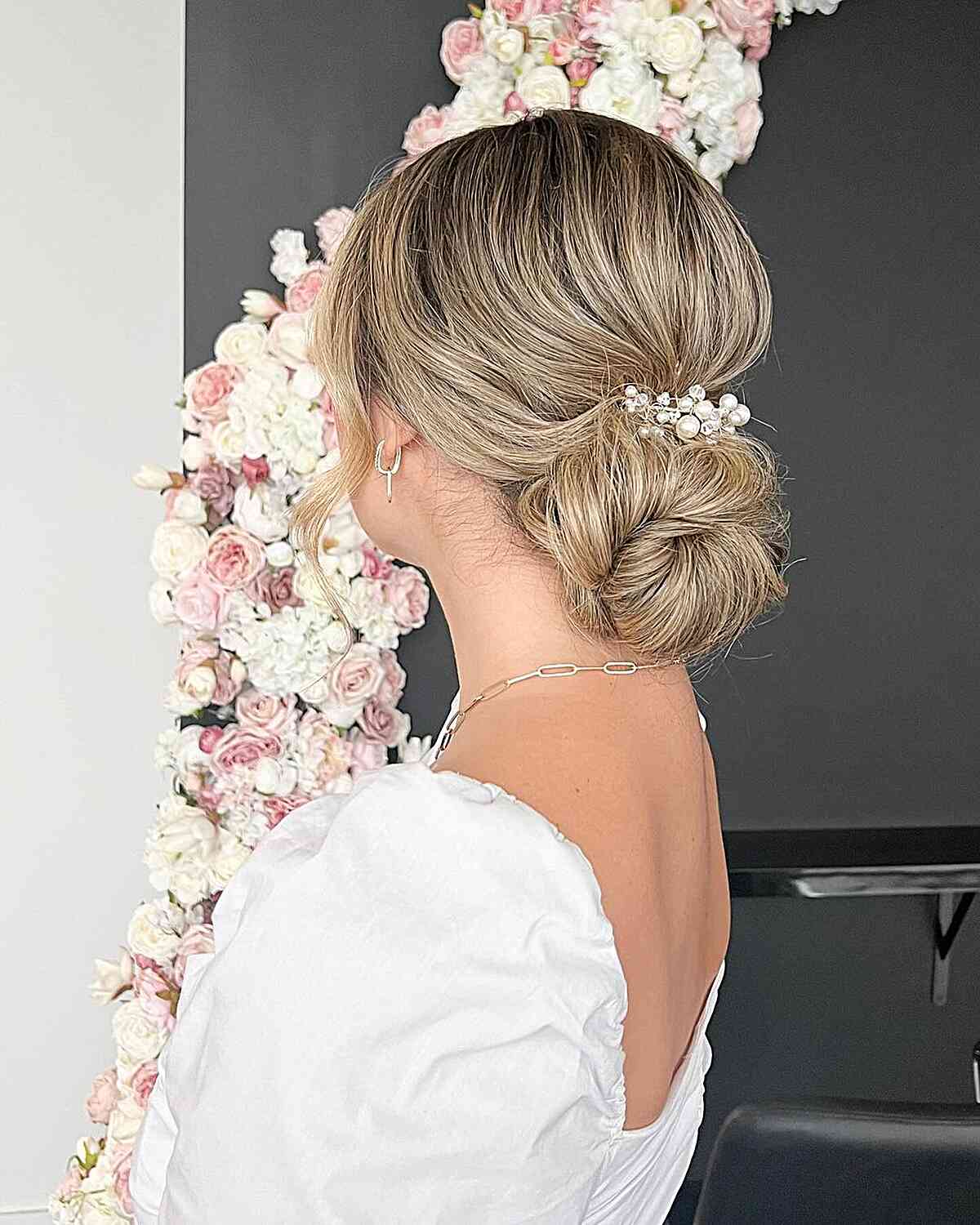Romantic Low Loose Bun with Pearl Accessories for Prom Night