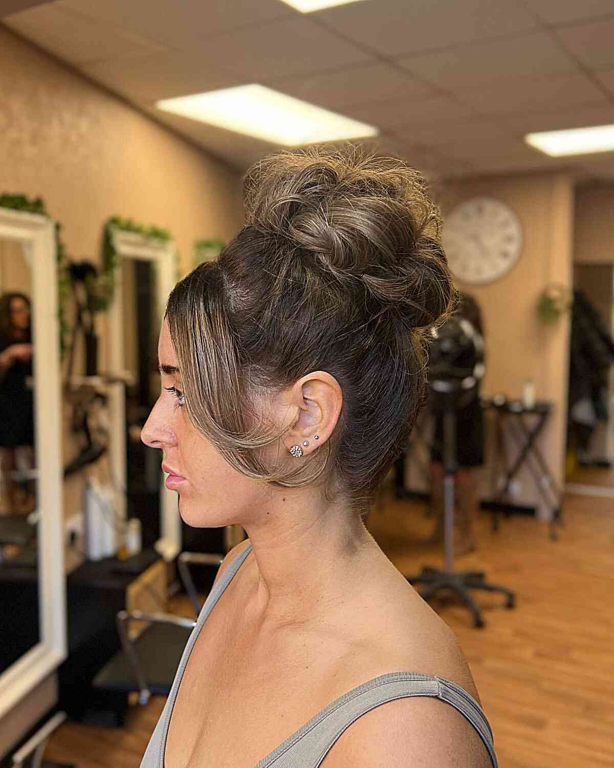 Romantic Textured Topknot with Curtain Fringe for a Wedding Guest