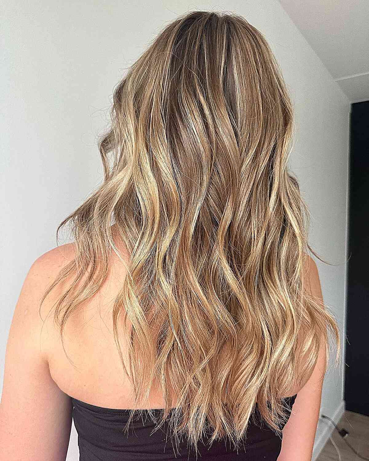 Root Melt Balayage with Honey Blonde Highlighted Hues for Longer Locks