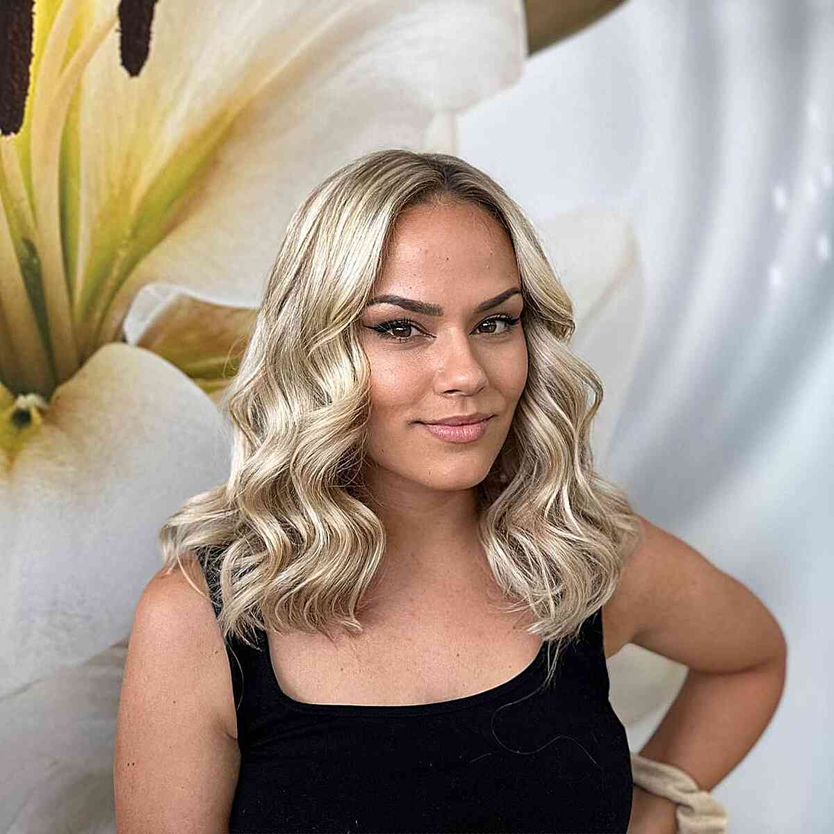 Rooty Blonde Balayage on Medium Hair for Women Aged 30