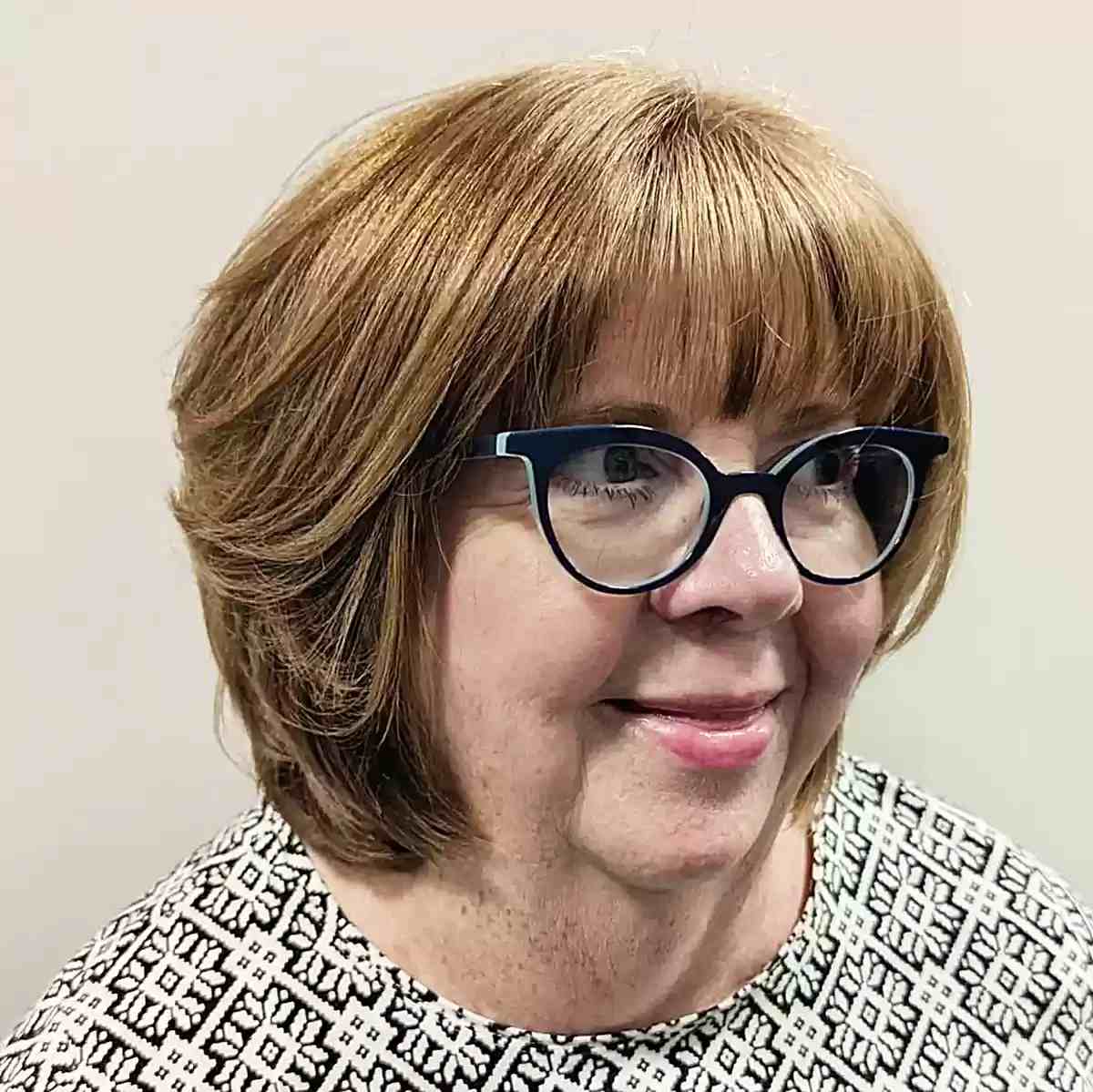 Neck-Length Round Bob with Wispy Bangs for Plus Size Women Over Fifty with Glasses