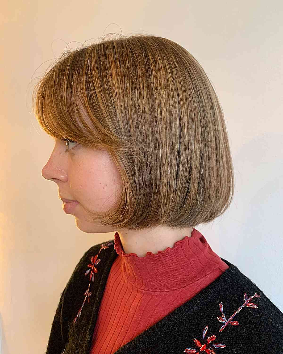 Round Bob with Side Swept Bangs