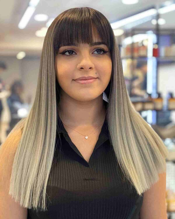 A Rounded shaped bangs for women with round faces