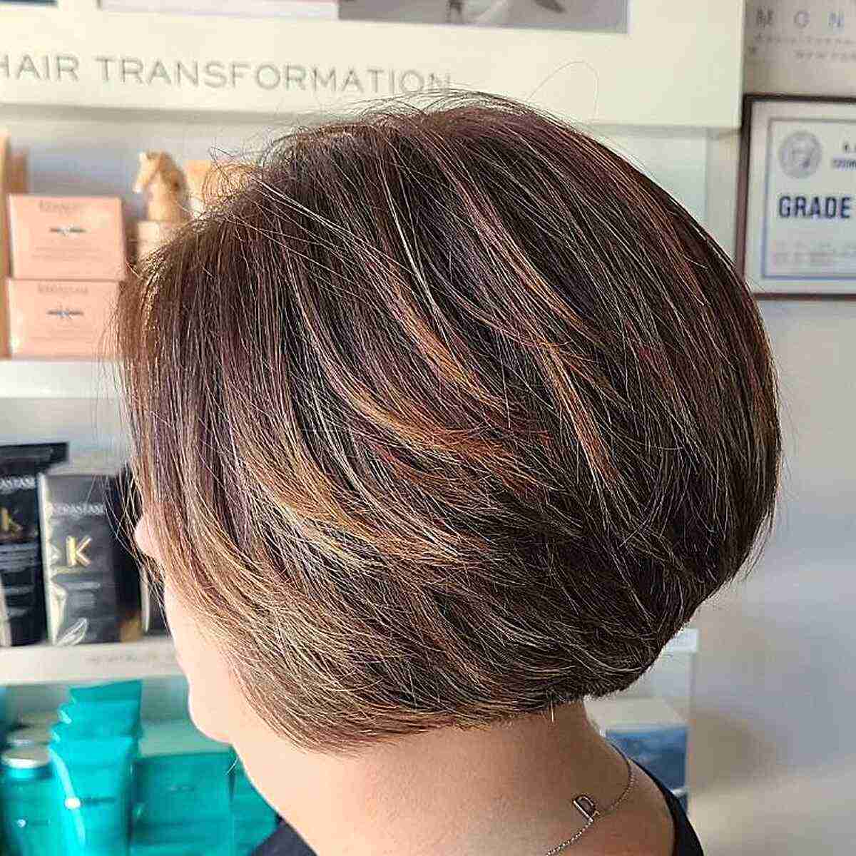 Short-Length Rounded Wedge Layered Bob Cut for Ladies Aged 50