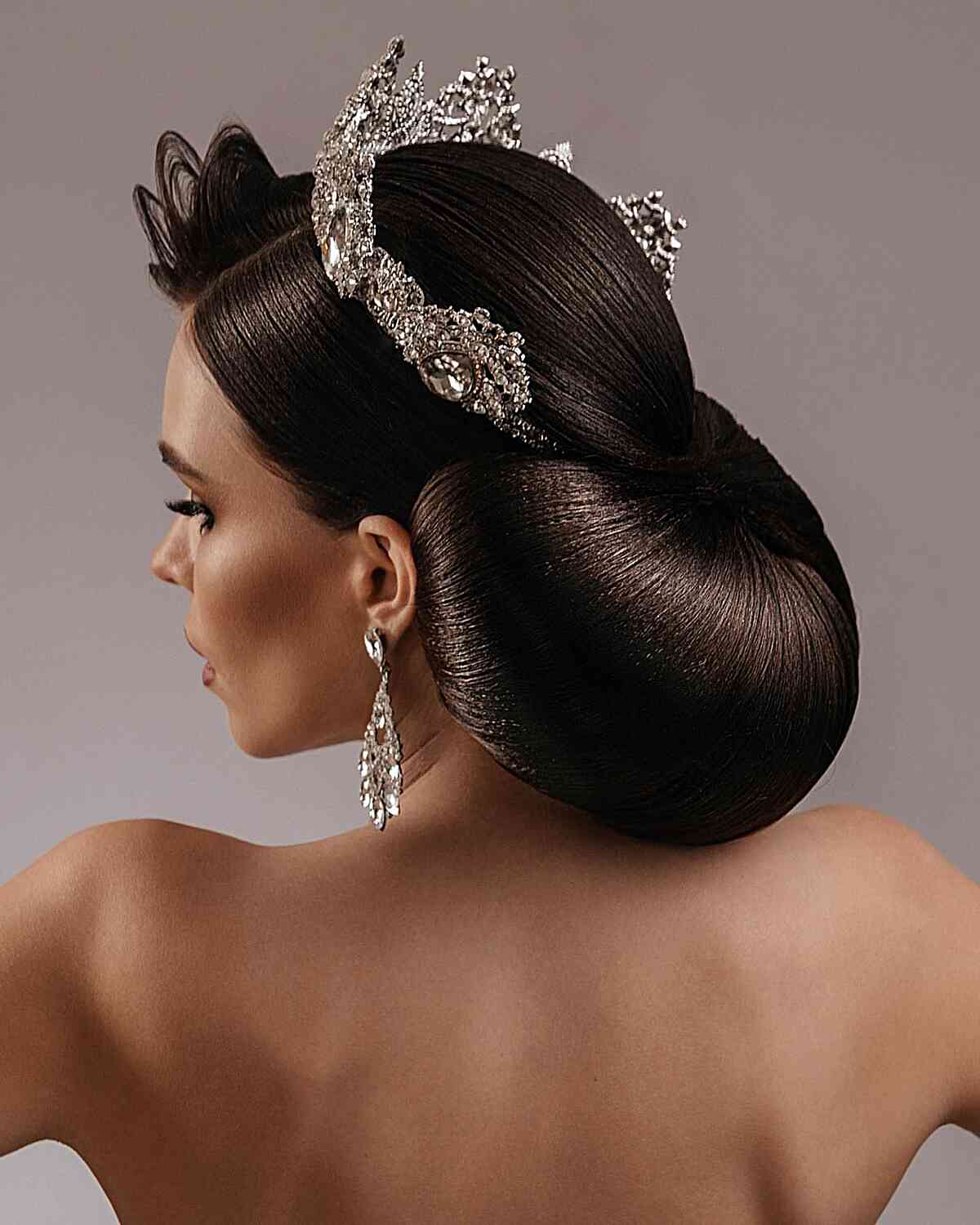 Royalty-Inspired Princess Updo and crown accessories for women with long dark hair