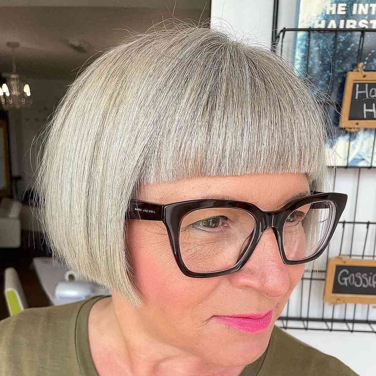 Salt and Pepper French Bob with Straight-Across Bangs for Ladies Over 60 with Glasses