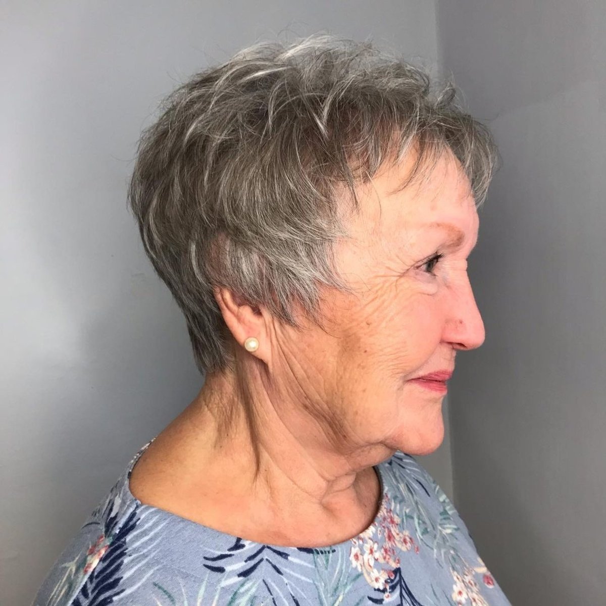 Simple salt and pepper pixie for women over 70