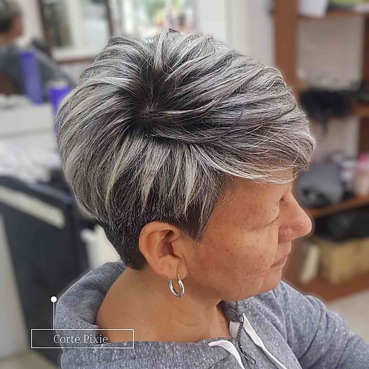 Salt-and-Pepper Pixie with Choppy Layers for woman over 60 years old