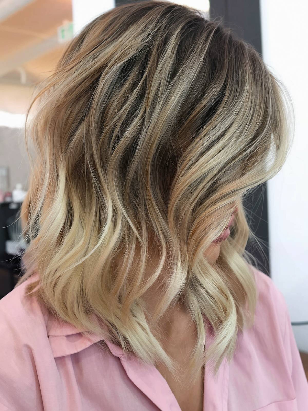 Sandy ash blonde hair balayage