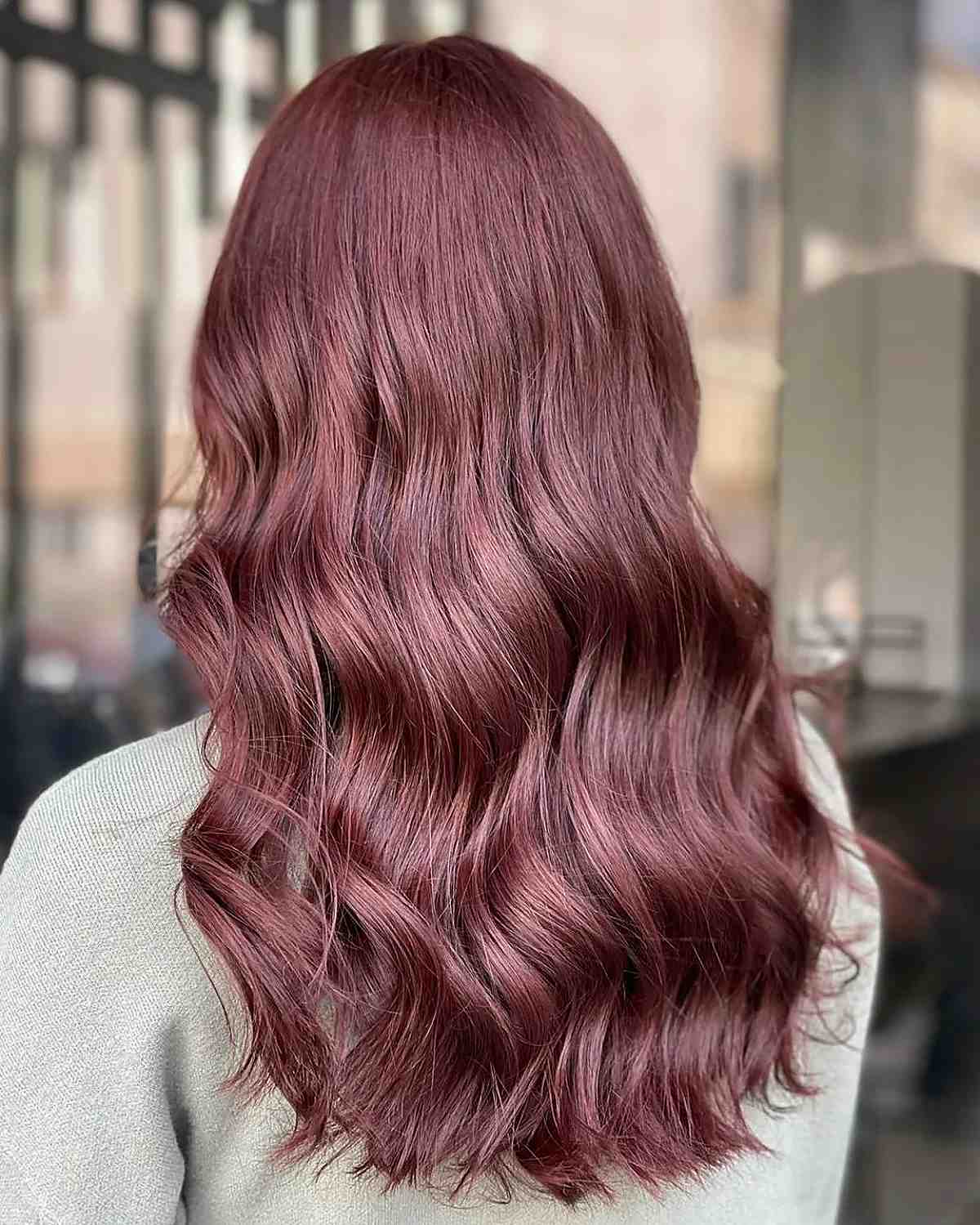 sangria burgundy on long wavy hair