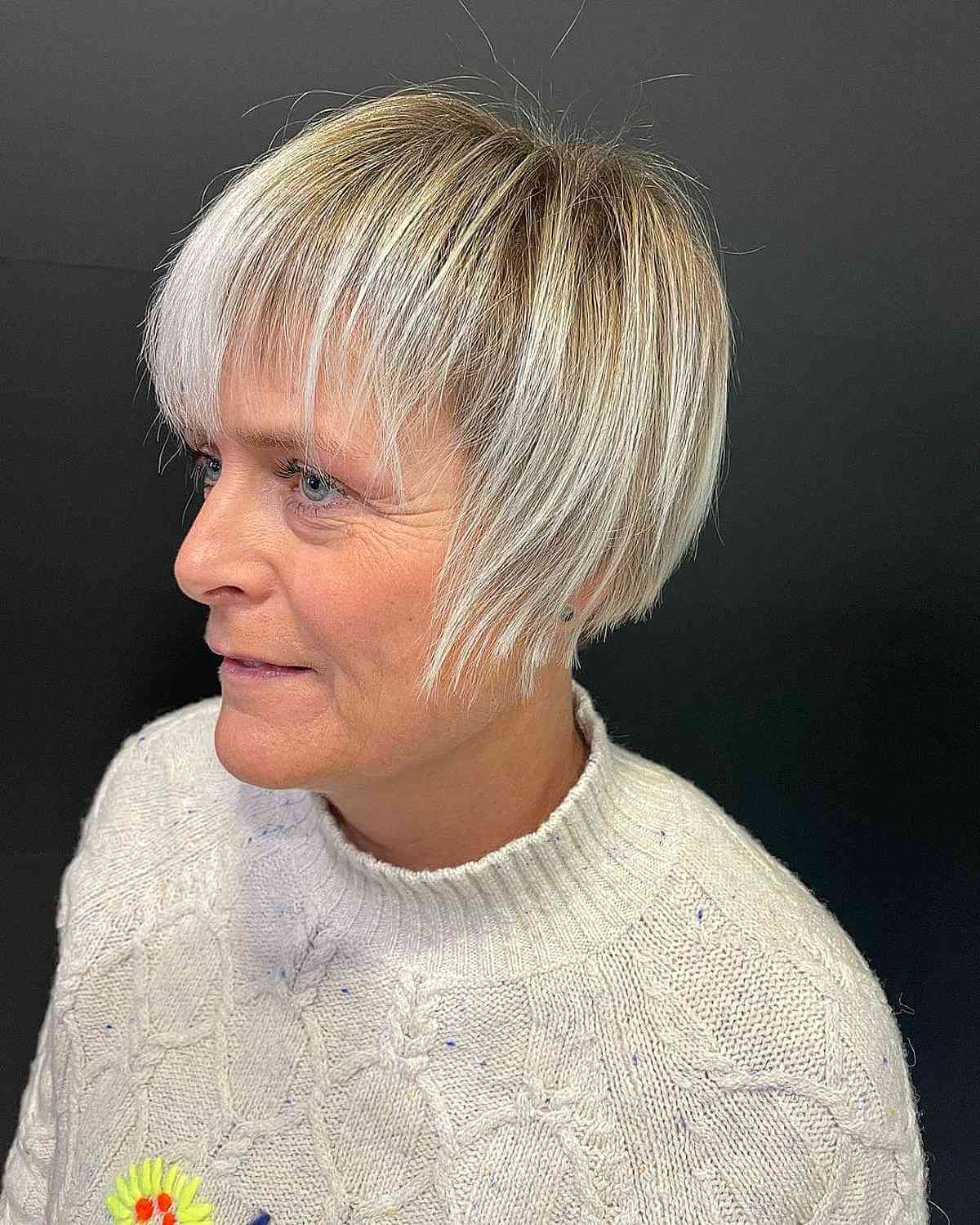 Woman with short blonde hair