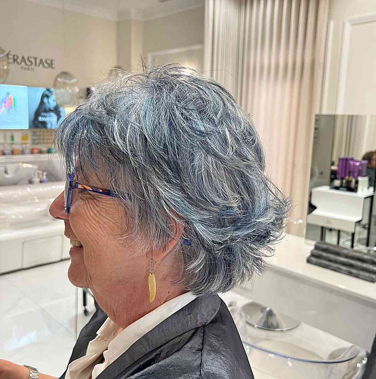 Sassy Short Hair with Feathered Choppy Layers and Balayage for Seniors Over 60 with Glasses