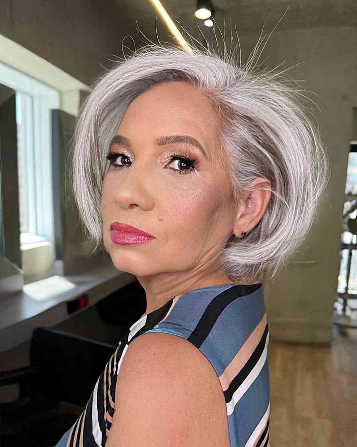 Sassy Side Parted Platinum Bob Cut for 60-year-olds with Fine Hair