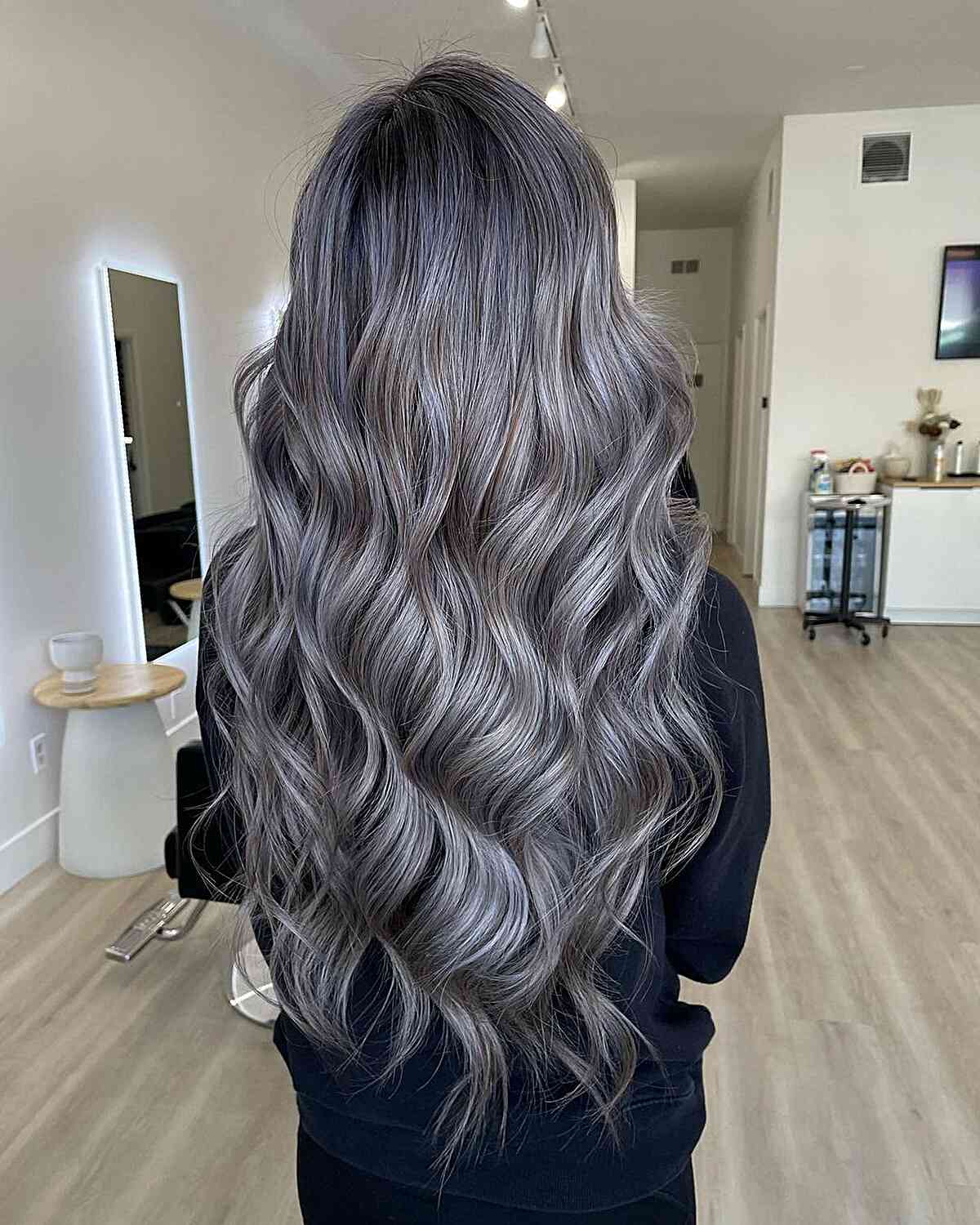 Sexy Metallic Silver Blonde Hair color on long wavy hair