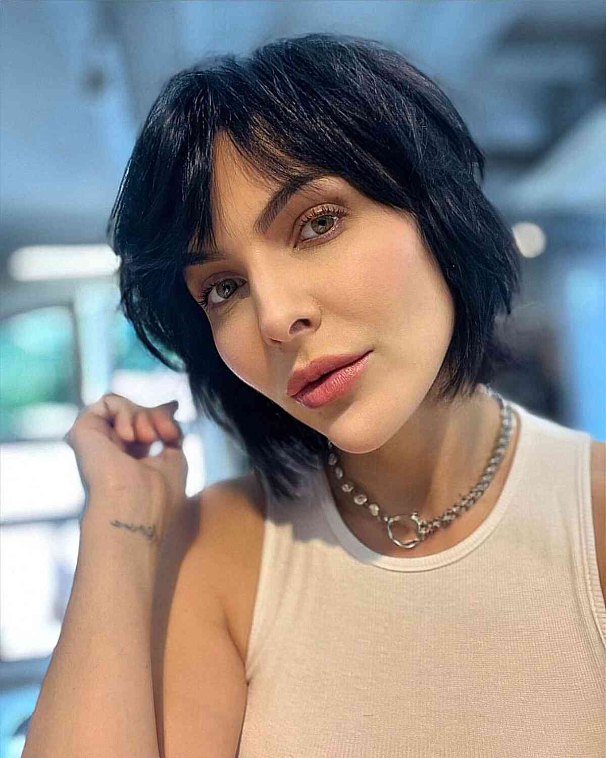 Sexy Short Cut with Curtain Fringe for women with diamond face shapes
