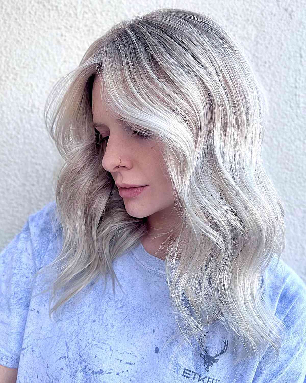 Shadow-Rooted Platinum Hair with Wispy Layers and Soft Waves