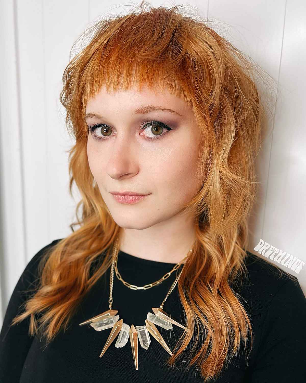 shag with straight across textured bangs