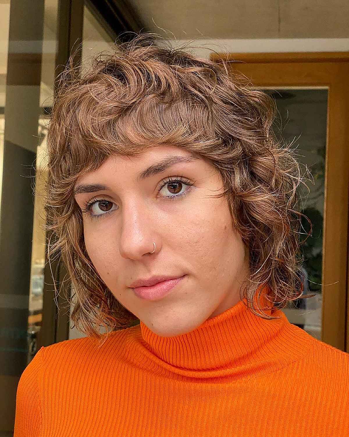 Shaggy Bob Cut with Bangs for Curly Hair