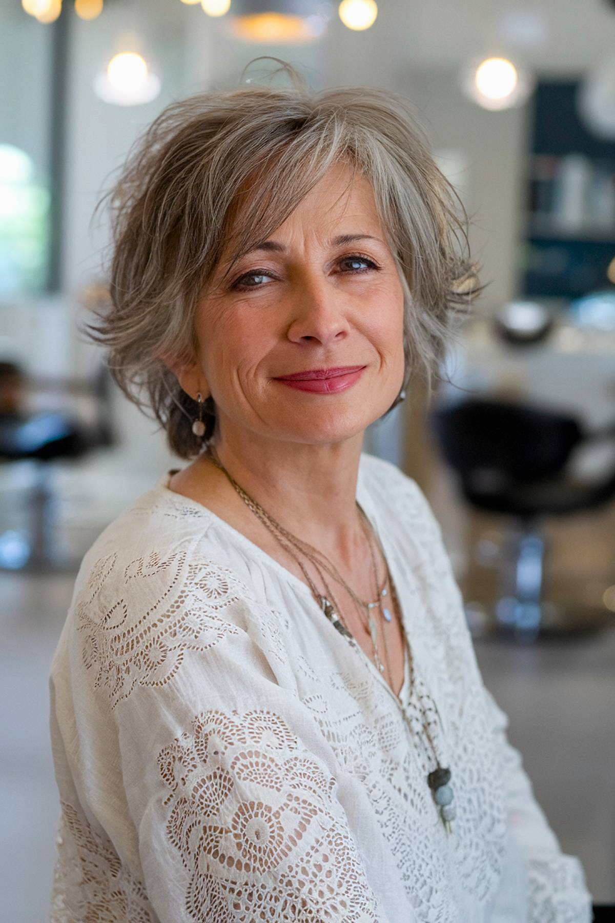 Elegant fine hair shag for women over 50 with soft layers and side-swept bangs for natural volume