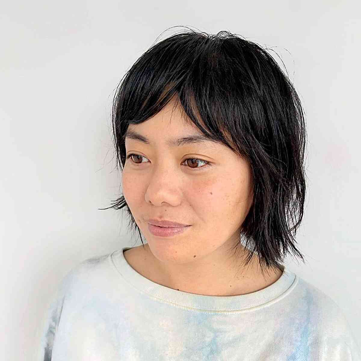 Shaggy Jagged Bob with Wispy Layers and Fringe