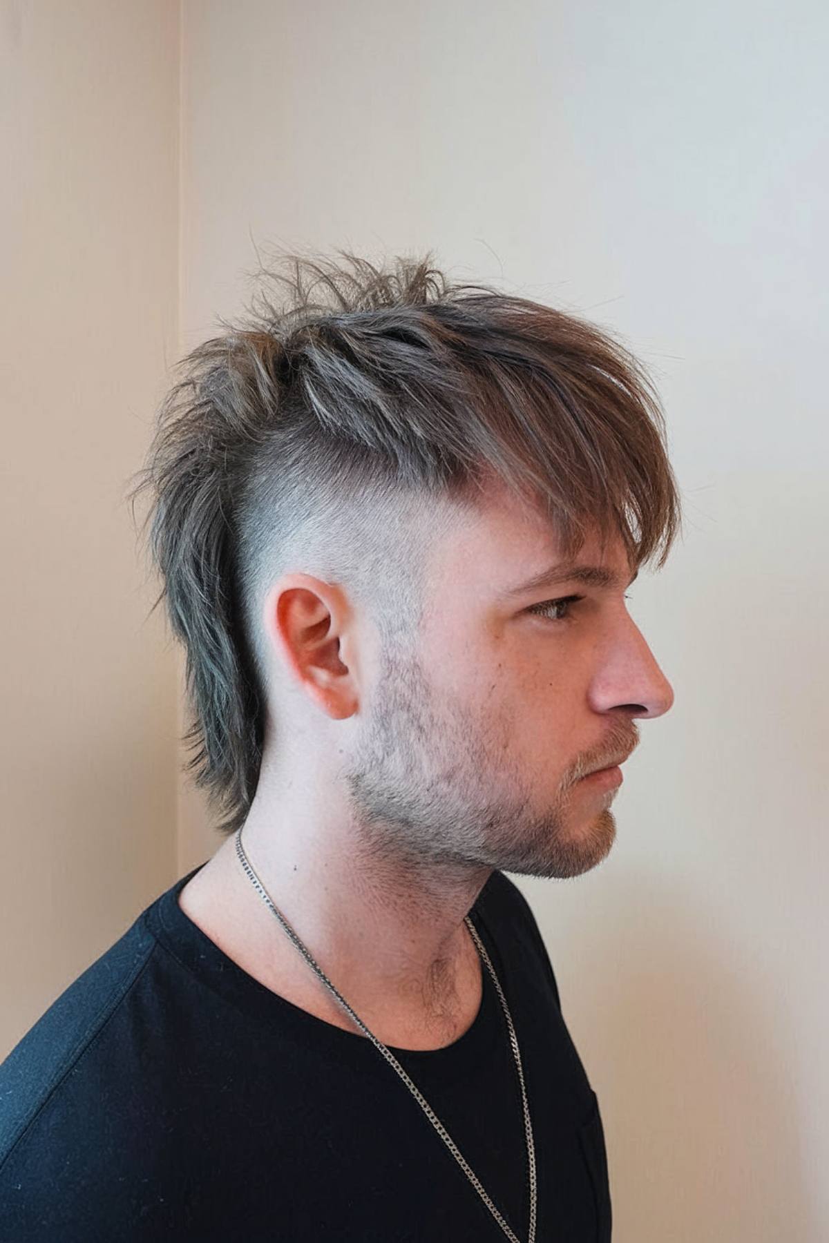 Shaggy mullet with fade hairstyle for men