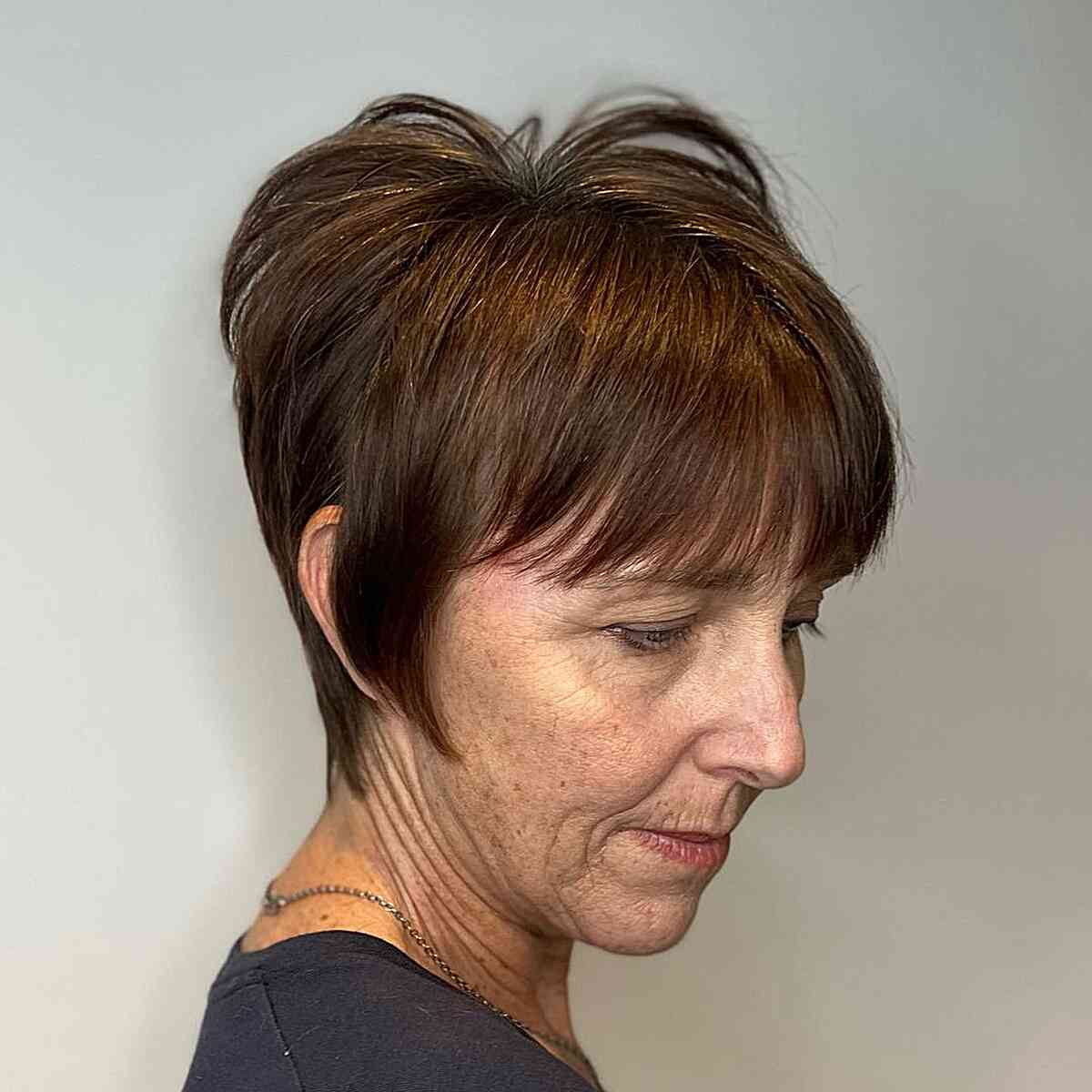 Shaggy Pixie with Crown Layers for 70-year-old Ladies with Fine Hair