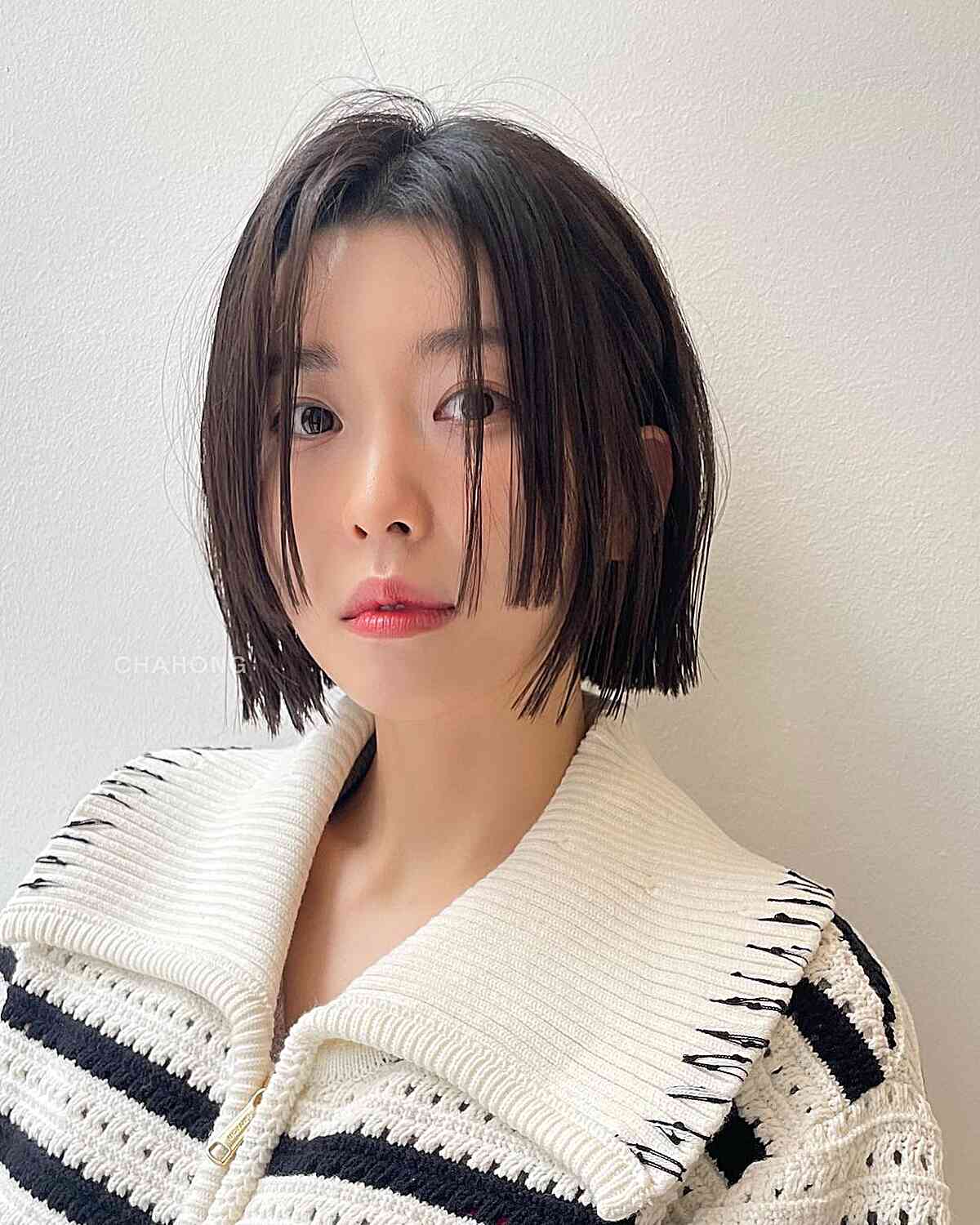 Sharp and short haircut for Asian girl