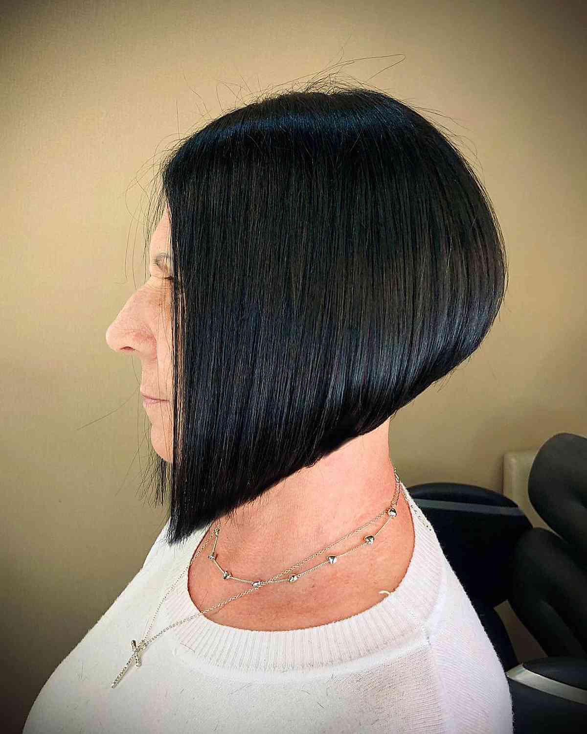 Sharply Angled Jet Black Bob for Thick-Haired 50-Year-Olds