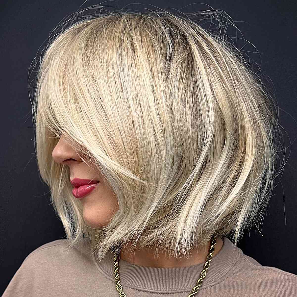 Short Above-the-Shoulder Bob with Volume for women with blonde hair
