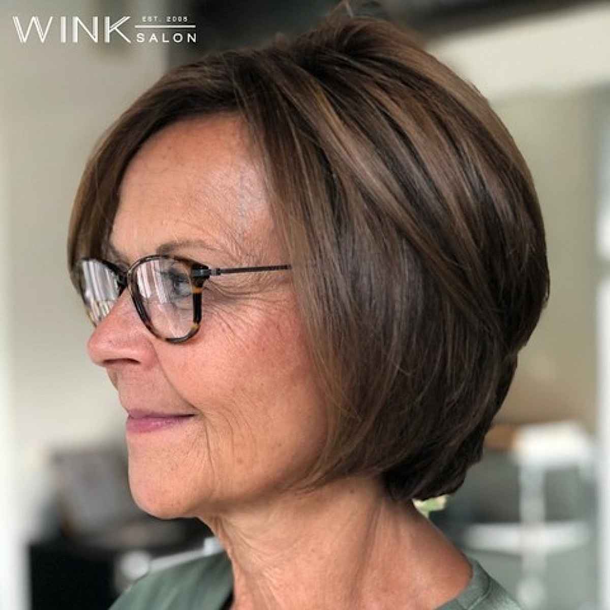 Short and Sophisticated Bob with a Side Part for 60-Year-Olds