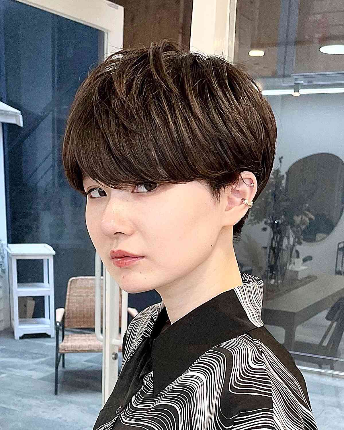 Short Androgynous Cut with Bangs and Crown Layers for Thick Hair