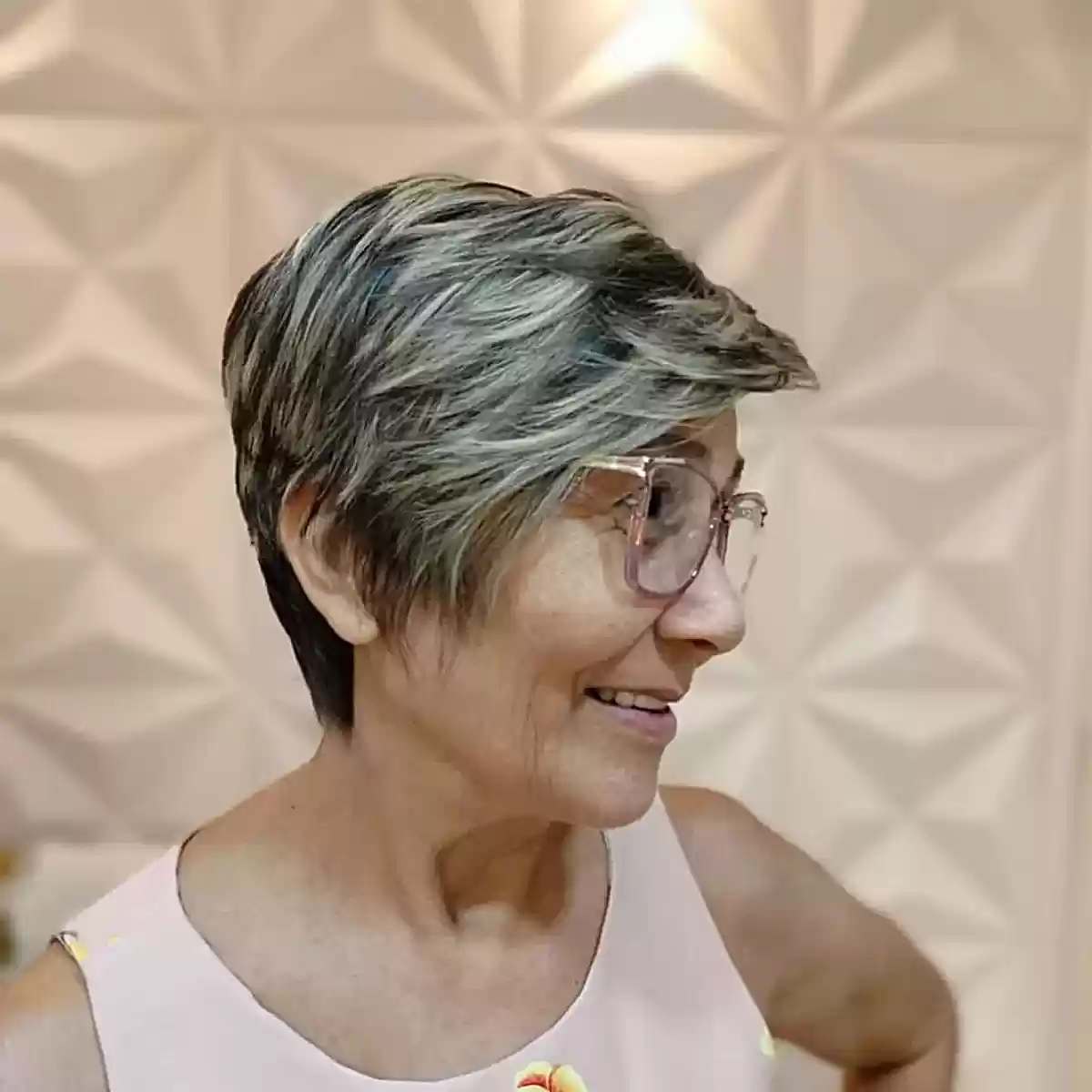 Short Black Hair with Ash Highlights on Women Over 60 Wearing Specs