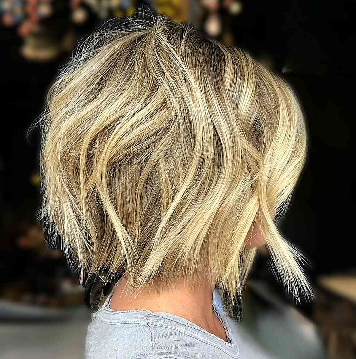 Short Blonde Bobbed Hair with Shattered Choppy Ends