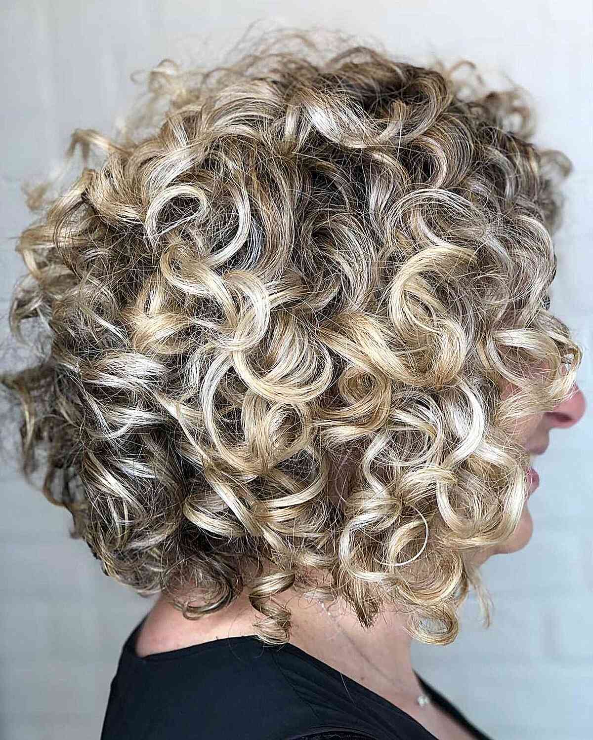Short Blonde Highlighted Curly Hair